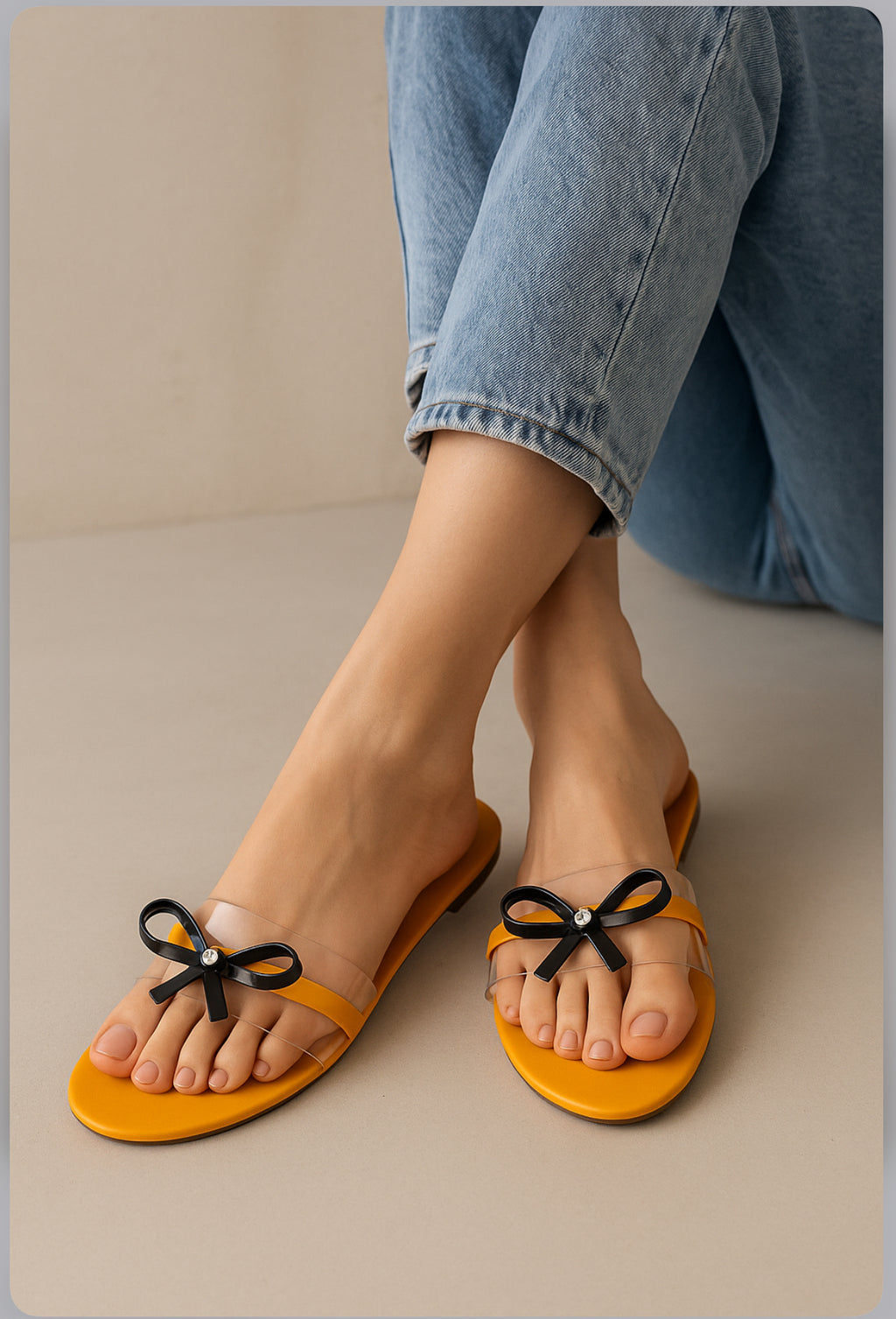 Mustard Yellow Slip-On Sandals with Transparent Straps & Black Bow – Trendy Flats for Women